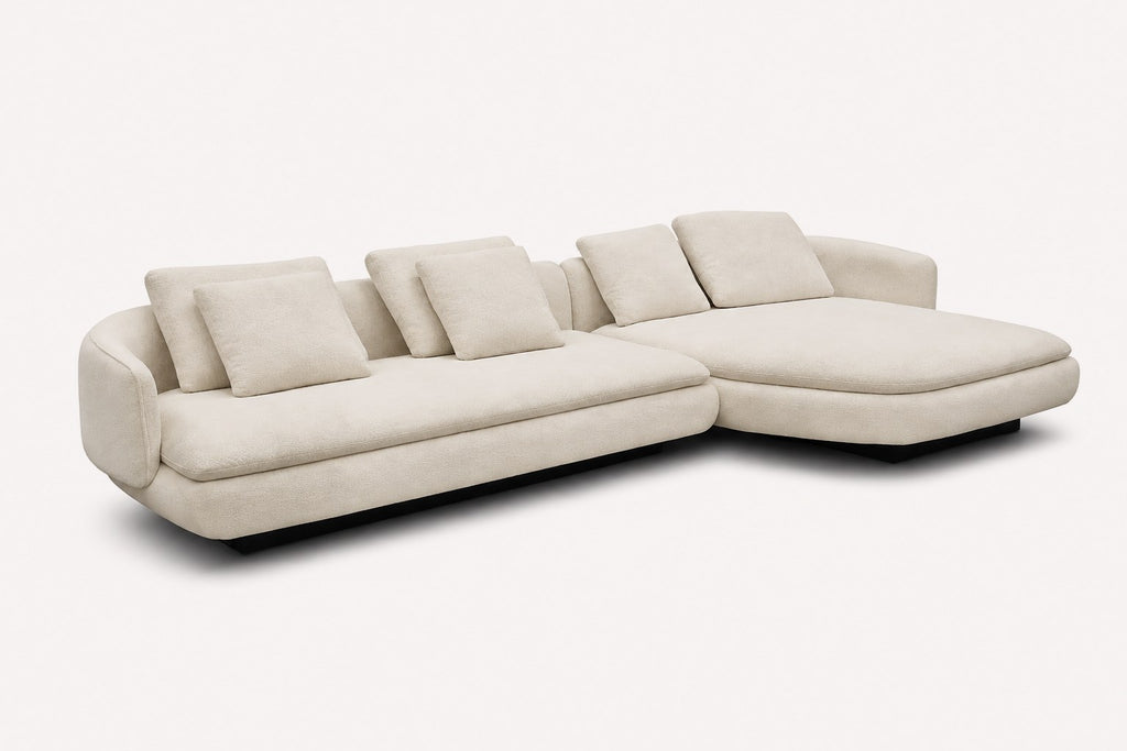 Lauren curved chaise sectional with loose back cushions and black base, view 2
