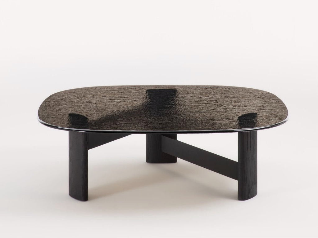 Noir coffee table with smoked glass top on black geometric wood base, view 2