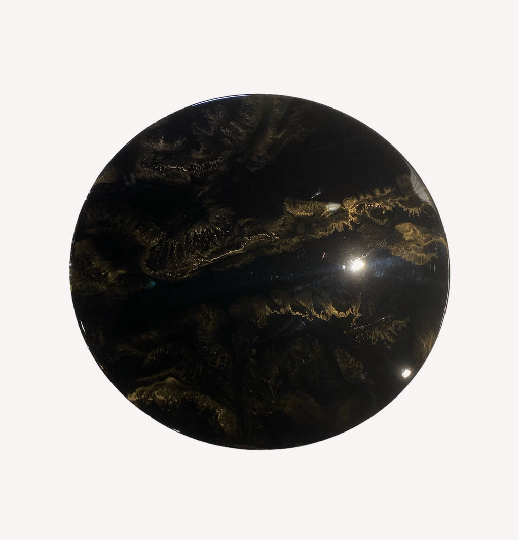 Black glossy round liquid marble coffee table on tapered pedestal, view 2