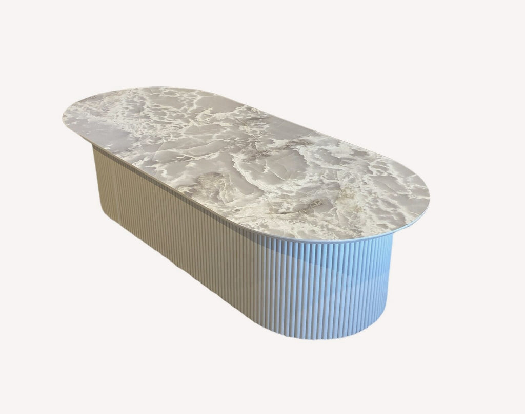 Star oval marble look coffee table on fluted ivory base, view 2