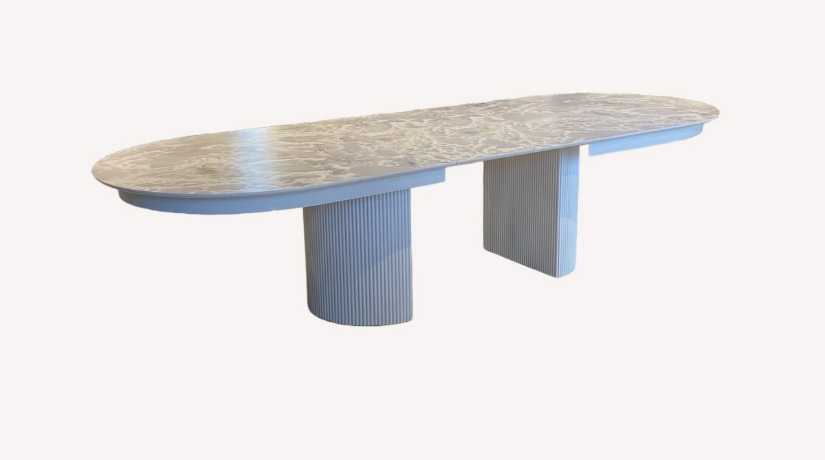 Dublin oval dining table on two fluted white pedestals, view 2
