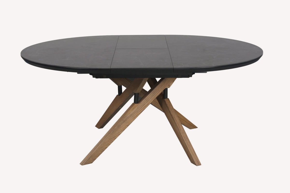 Scala round charcoal dining table on crossed wood legs, view 3