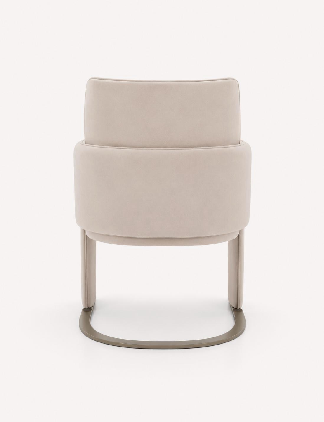 Lauren upholstered dining armchair with rounded arms and curved metal base, view 3