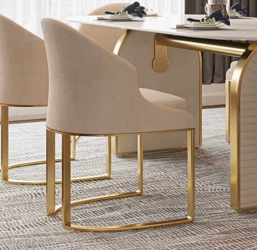 Andrea beige curved dining chair with polished gold sled legs, view 4