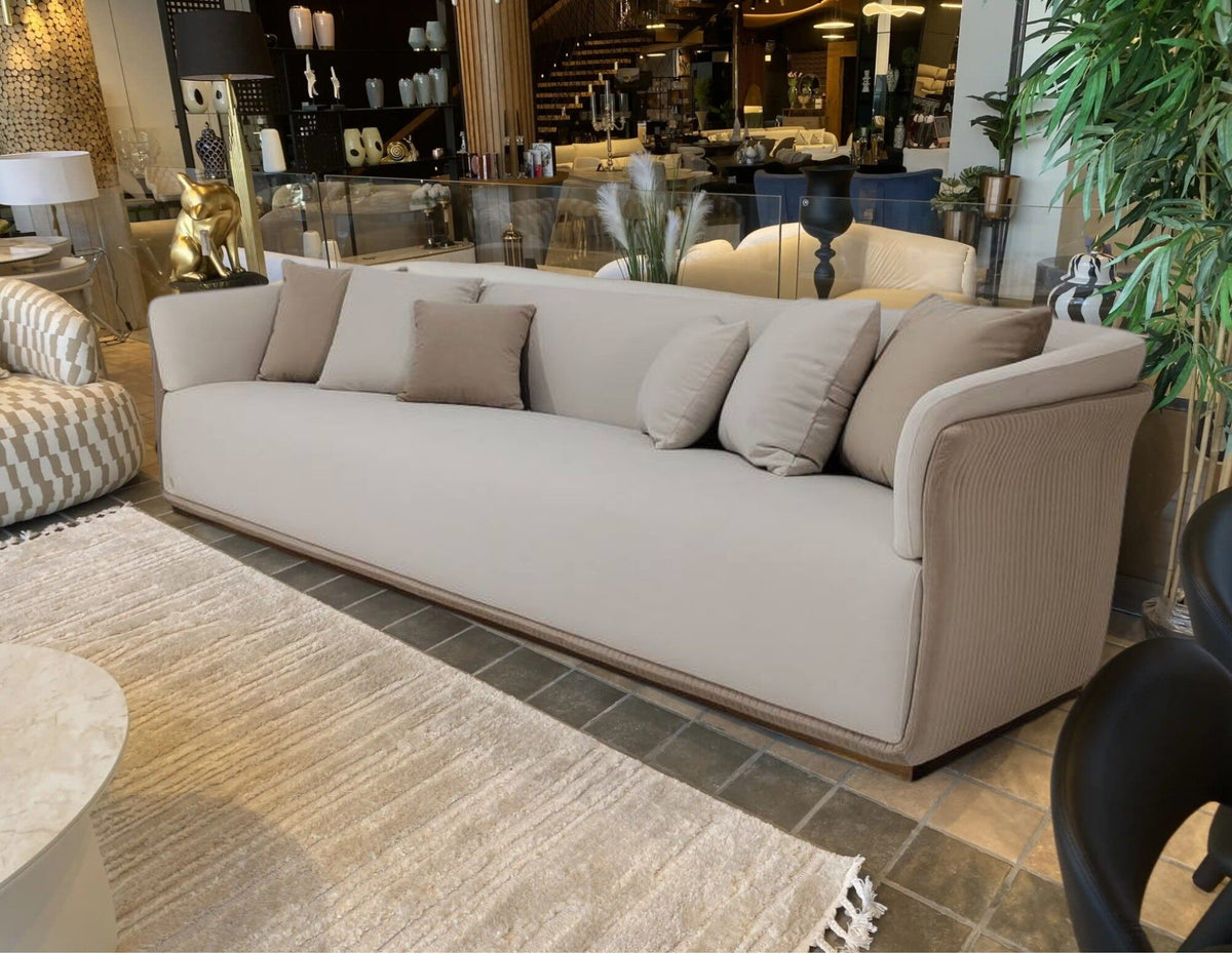 Christy long low greige sofa with curved arms, view 3