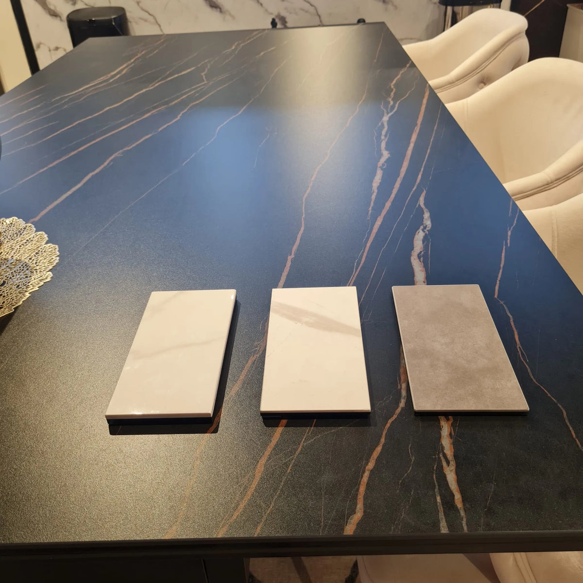Busto black porcelain dining table on sweeping black base, view 3