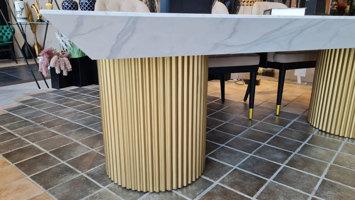 King marble look dining table on fluted gold drums, view 4