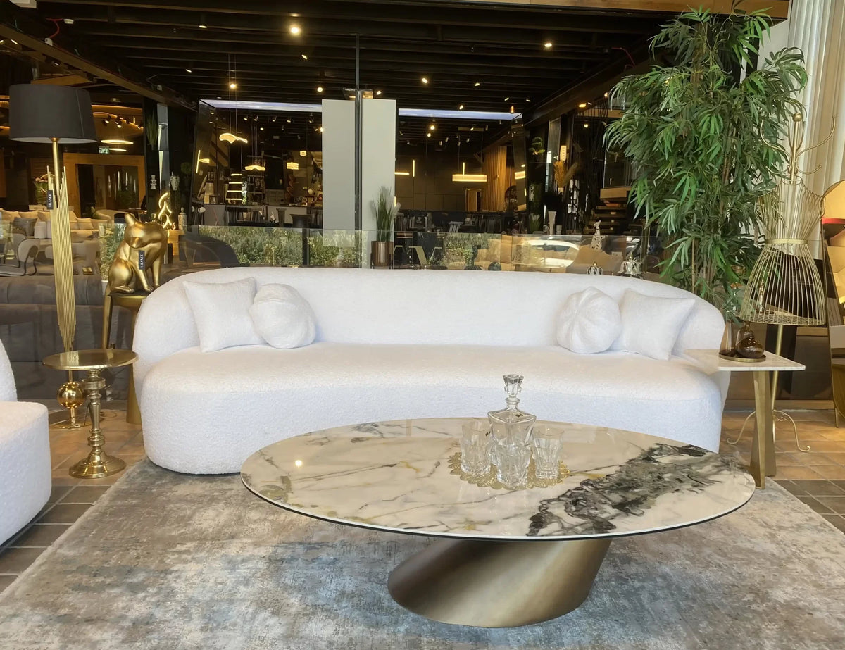 Netz oval porcelain coffee table on angled brushed gold base, view 3
