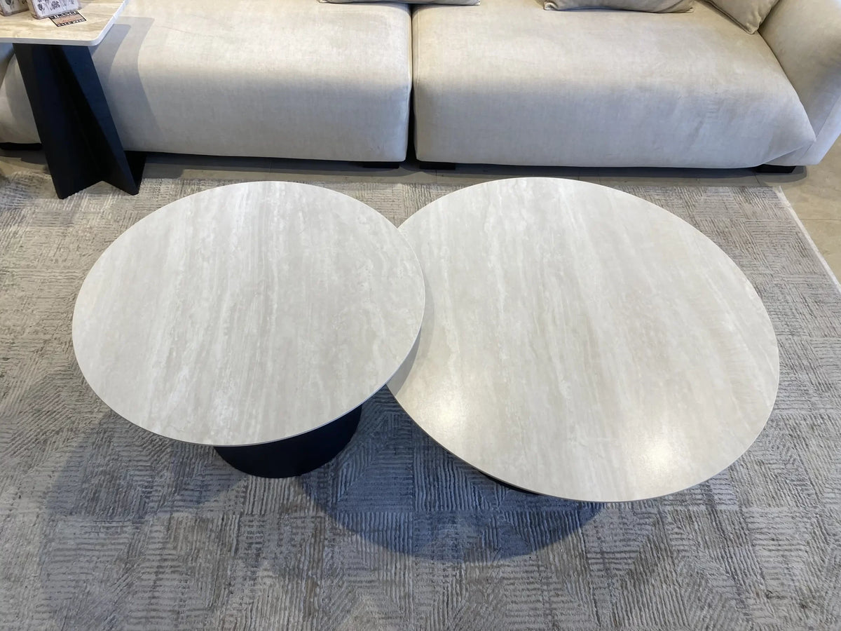 Verona pair of round travertine look tables on black cones, view 3