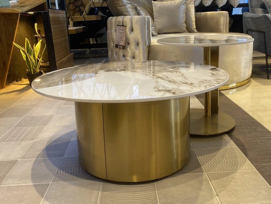 Golden pair of round granite tables on gold legs, view 3