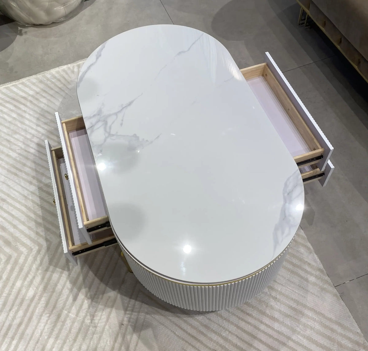 Levavit fluted white media console and oval coffee table set with gold legs, view 4