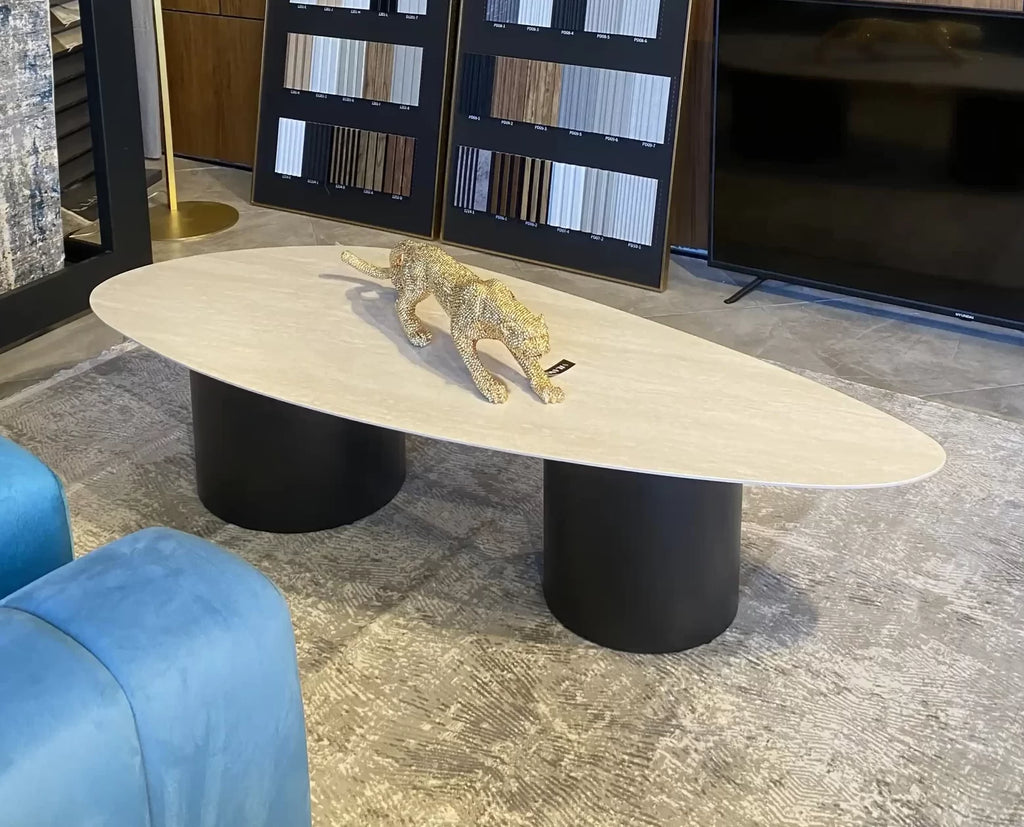 Tavor organic travertine look coffee table on navy cylinders, view 5