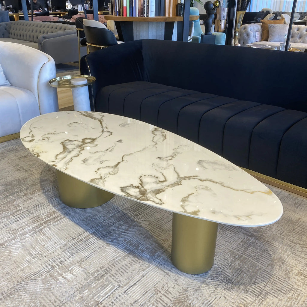 Kinder oval epoxy coffee table with gold veining on gold cylinders, view 3