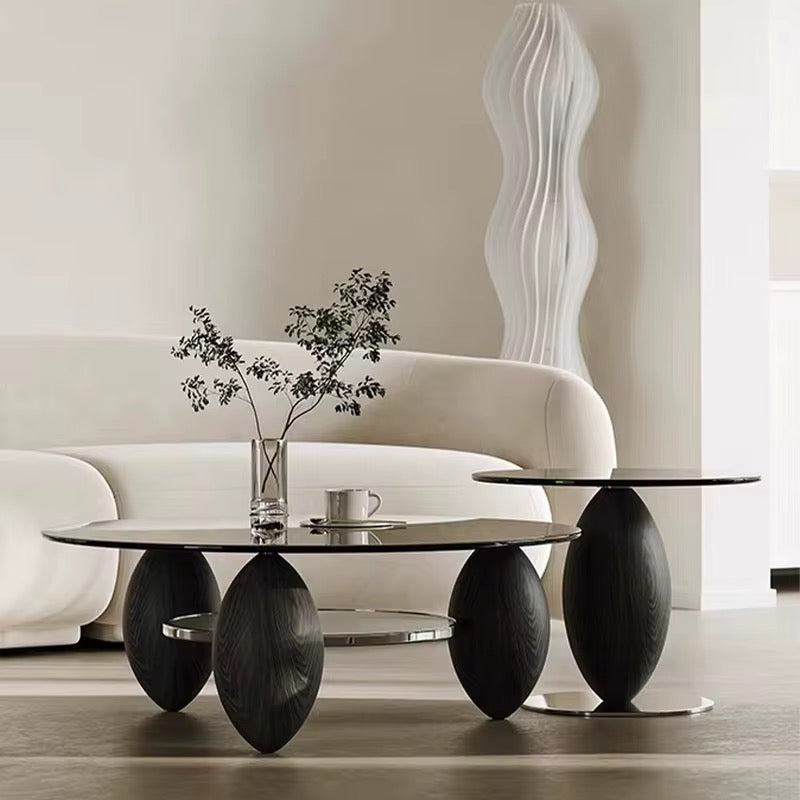 Black Gaia amber glass coffee tables on dark solid wood legs, view 2