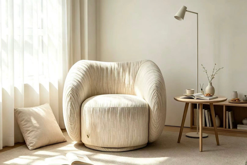 Sorrel rounded sculptural swivel chair in textured woven fabric, view 5