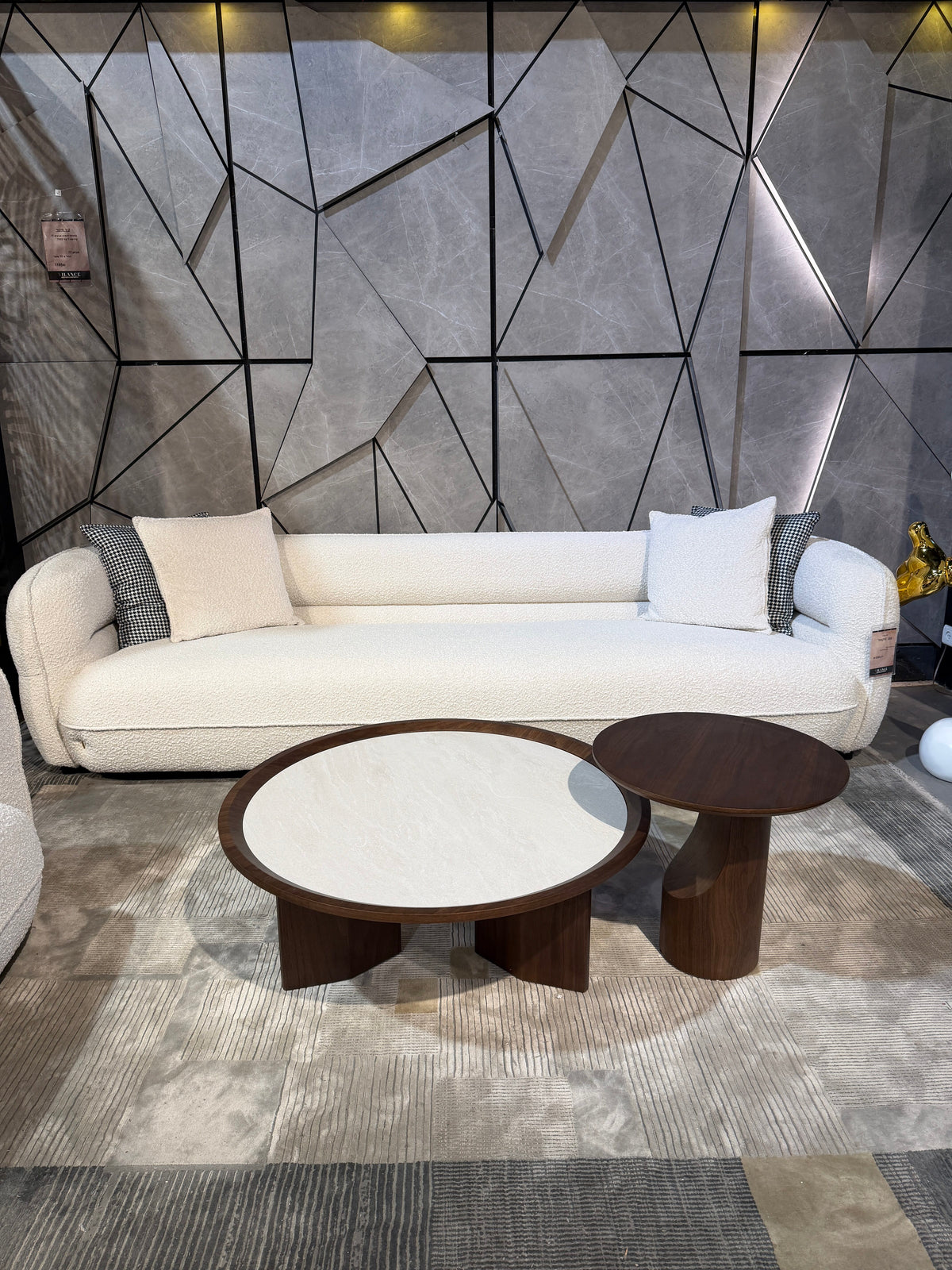 Milano pair of round walnut coffee tables on stone bases, view 3