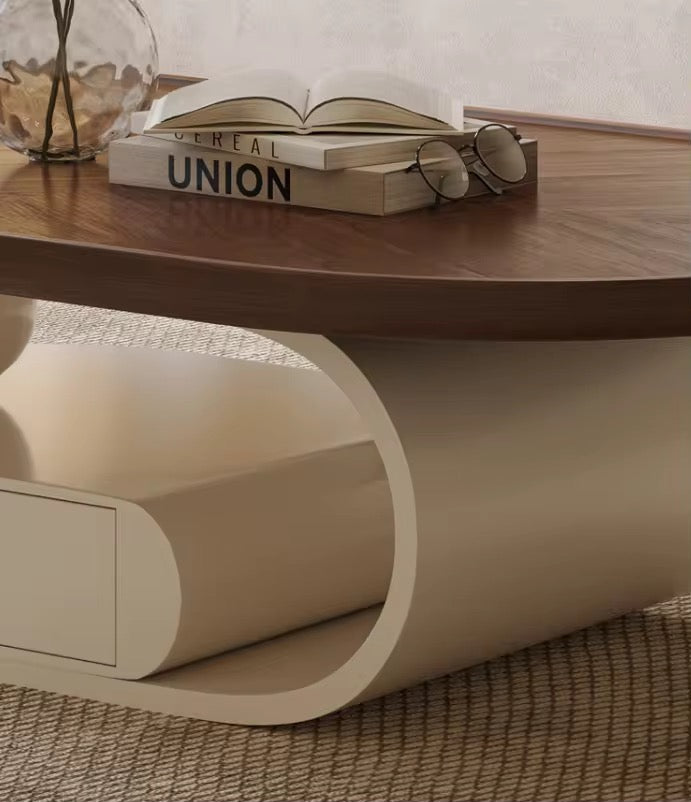 Queen oval walnut coffee table on curved cream base with drawer, view 4
