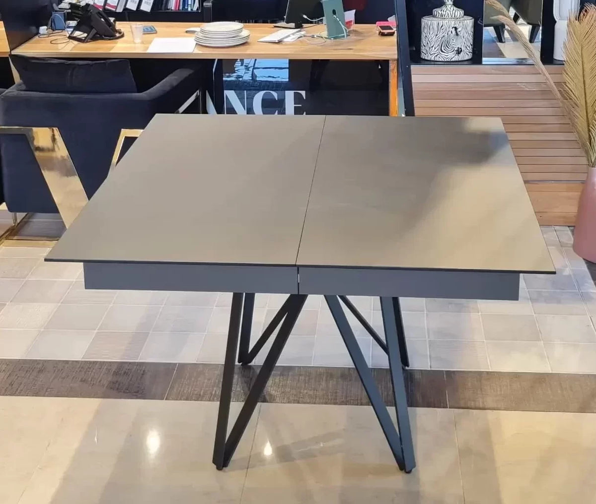 Marshall square gray extendable dining table on angular black legs, view 2