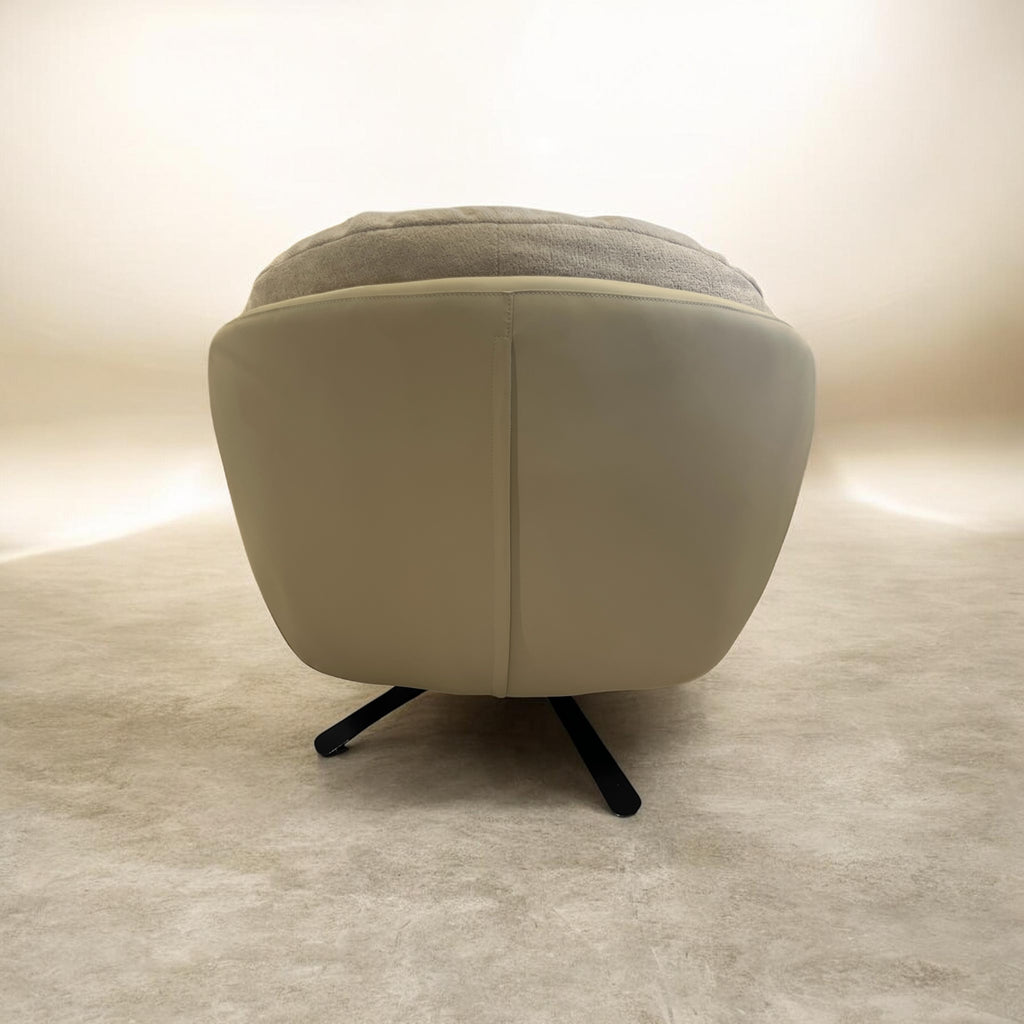 Marshmallow round swivel chair with leather shell and soft fabric interior, view 4