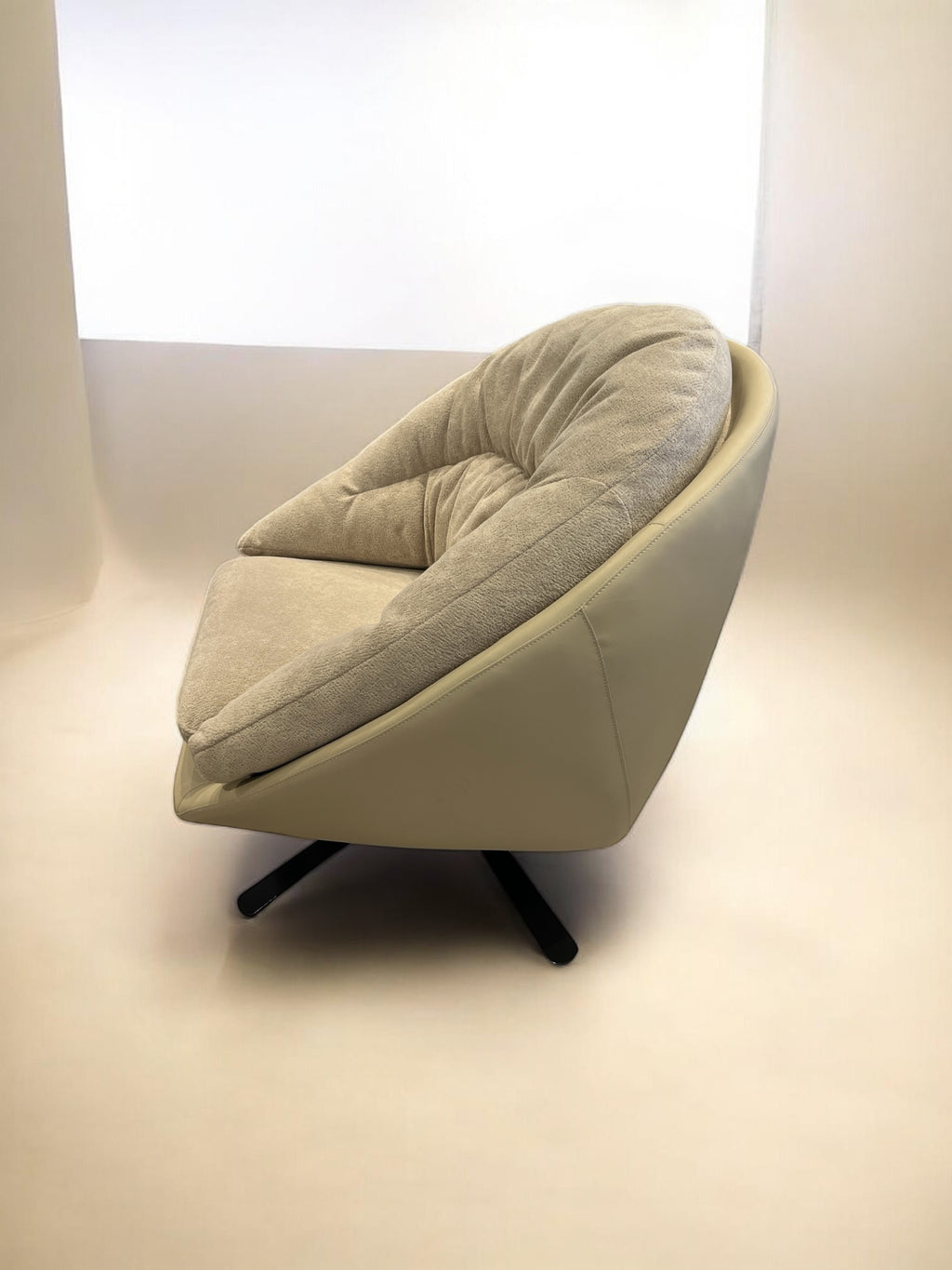 Marshmallow round swivel chair with leather shell and soft fabric interior, view 5